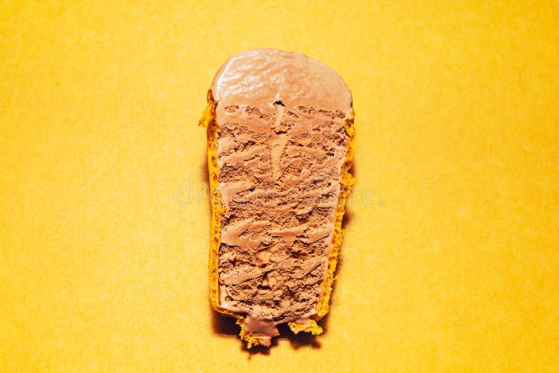 Chocolate ice cream bar reveals its smooth and creamy texture royalty free stock image