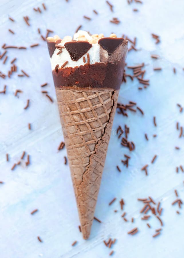 Chocolate Ice Cream Cone with Chocolate Sprinkles Stock Photo Image