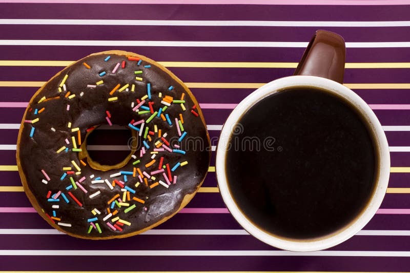 Chocolate iced donut and coffee