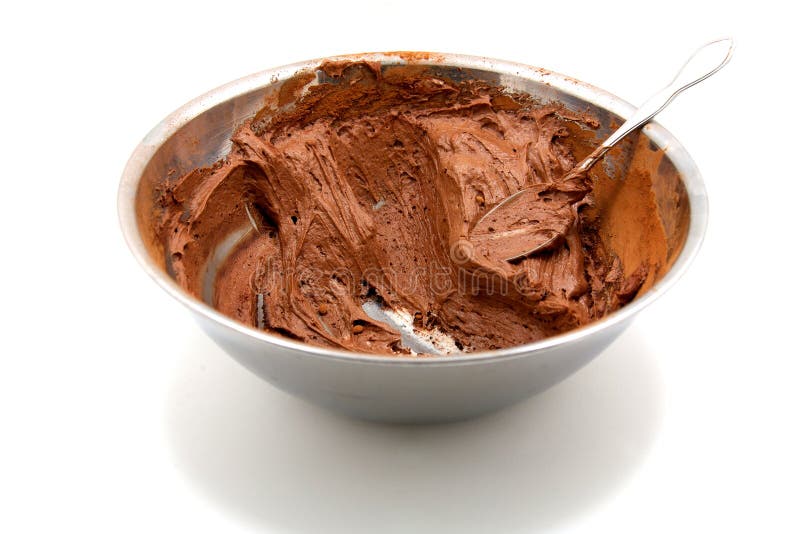 Chocolate icing in mixing bowl