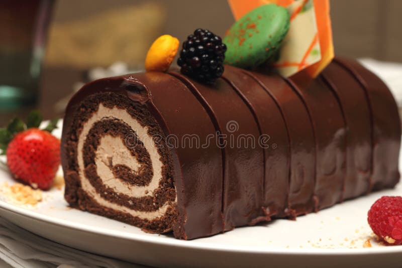 Chocolate log cake with strawberry