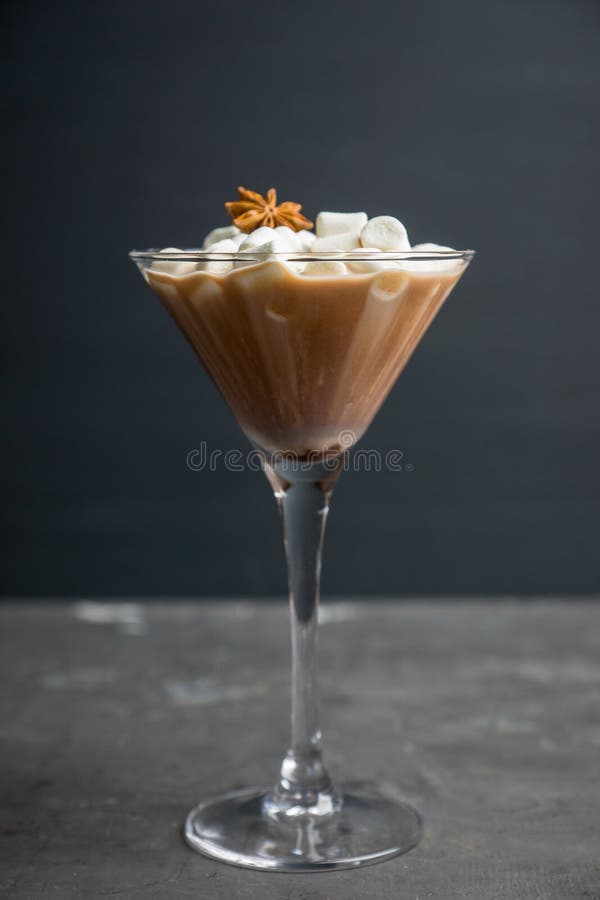 Chocolate Martini with Spices and Marshmallow on the Rustic Background