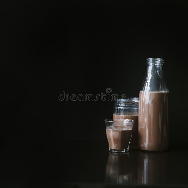 https://thumbs.dreamstime.com/b/chocolate-milk-shake-glass-jar-bottle-black-background-high-resolution-photo-chocolate-milk-shake-glass-jar-bottle-black-233412623.jpg