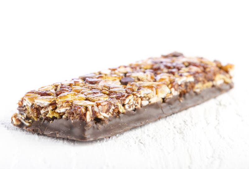Chocolate Muesli Bar on White Wooden Table Stock Photo - Image of