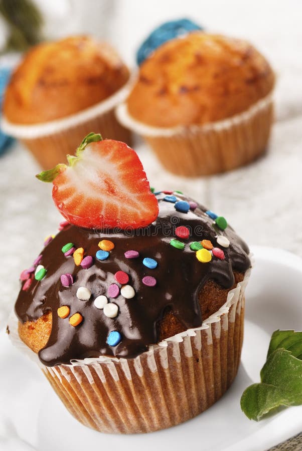Chocolate Muffin with Strawberry on Top Stock Image Image of cupcake, plate 28555539