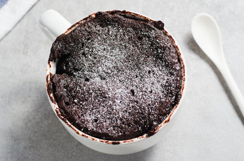 Chocolate Mug Cake, Homemade Cake Cooked in the Microwave on Bright