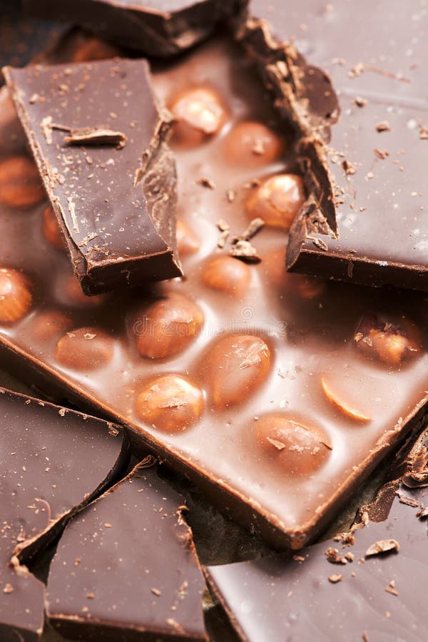 Chocolate with Nuts and Dark Chocolate Closeup. Stock Photo Image of