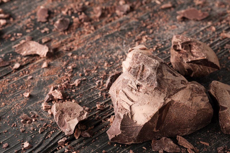 Chocolate pieces on a dark backround royalty free stock photography Chocolate pieces on a dark backround royalty free stock photography