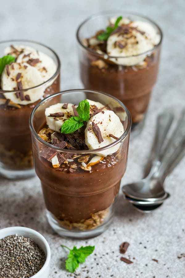 Chocolate Pudding with Chia and Banana in Glasses. Healthy Dessert or