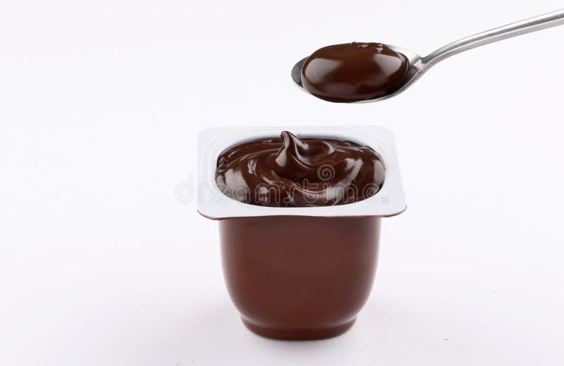 Chocolate pudding cup plastic  with spoon on white background