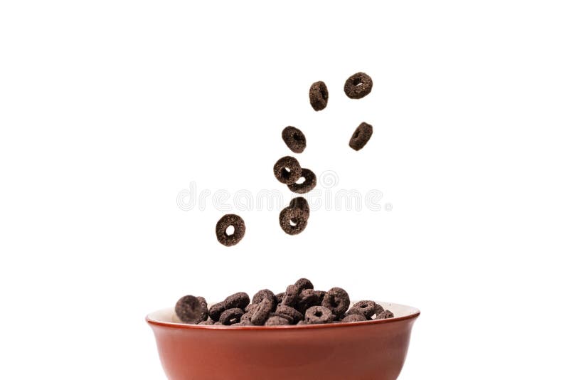 Chocolate Rings Cereal Spill Out into a Bowl. Breakfast Stock Image