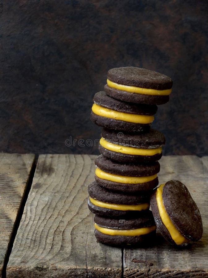 Chocolate Sandwich Cookies with Orange Cream Piled High Back Stock