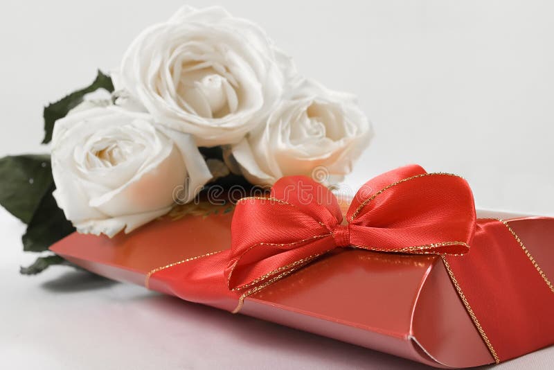 Chocolates and flowers stock image. Image of love, present 19143073