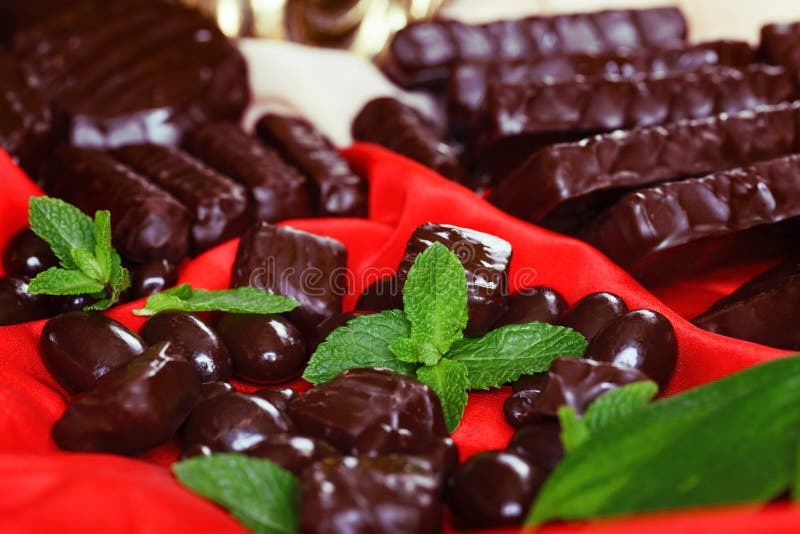 Chocolates and Jelly Beans in Bulk on a Red Silk Stock Image Image of