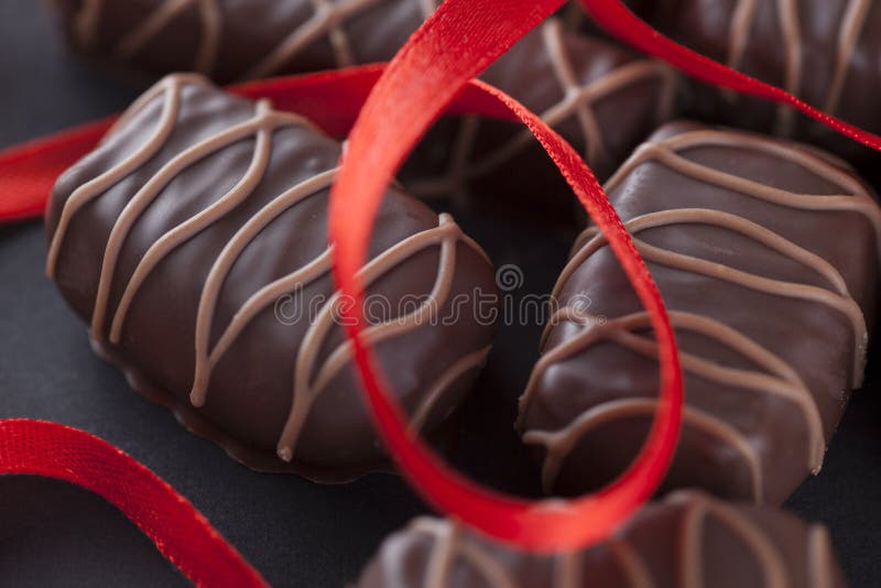 Chocolates with Ribbon stock image. Image of flavor, party 27243321