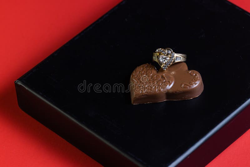 Chocolates and a ring stock photo. Image of dark, romantic 268859552