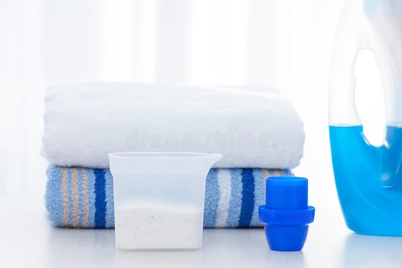Choice between Washing Liquid and Detergent Powder Concept Stock Photo