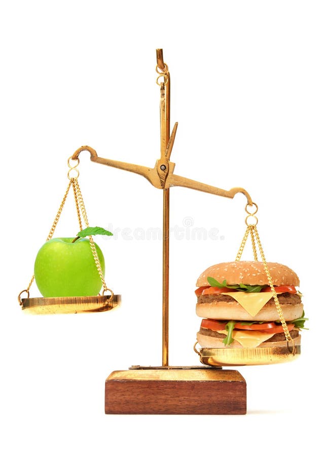 Choix de régime entre la pomme et l'hamburger images libres de droits Choix de régime entre la pomme et l'hamburger images libres de droits