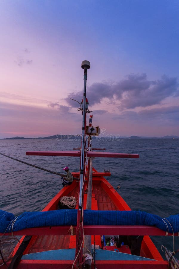 CHONBURI THAILAND - JANUARY 14 2018: fisherman work and travel by fisherman boat with fishing rod and fisherman gears on JANUARY 14, 2018 at SAMAE SAN in CHONBURI THAILAND