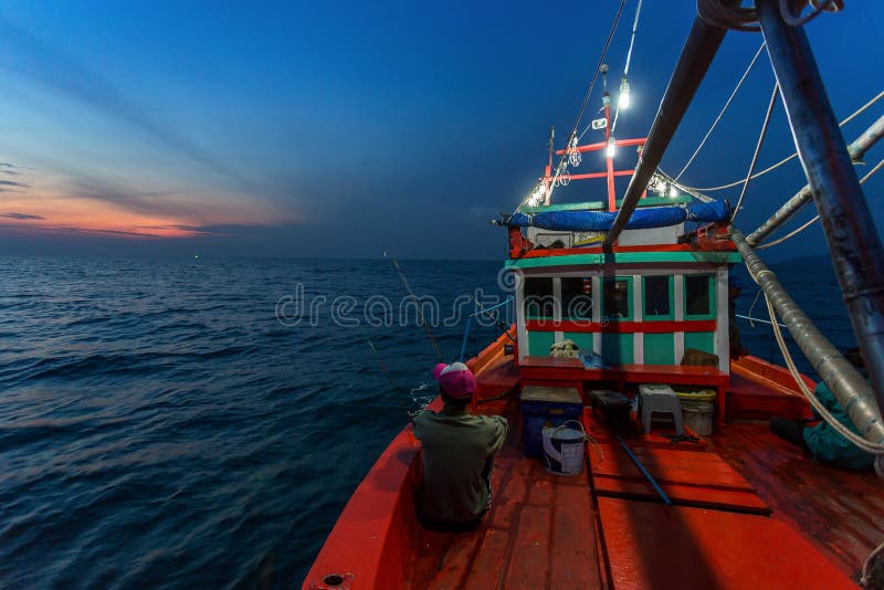 CHONBURI THAILAND - JANUARY 14 2018: fisherman work and travel by fisherman boat with fishing rod and fisherman gears on JANUARY 14, 2018 at SAMAE SAN in CHONBURI THAILAND
