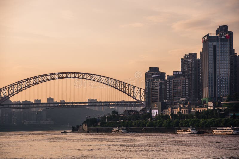 Chongqing arched road bridge at sunset