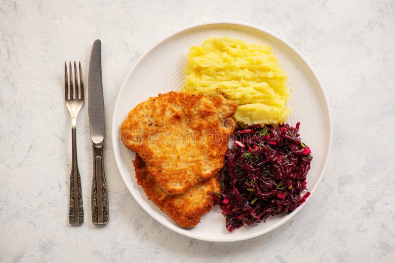 Chop Pork Cutlets , Served with Mashed Potatoes and Beetroot Salad. Stock Image Image of