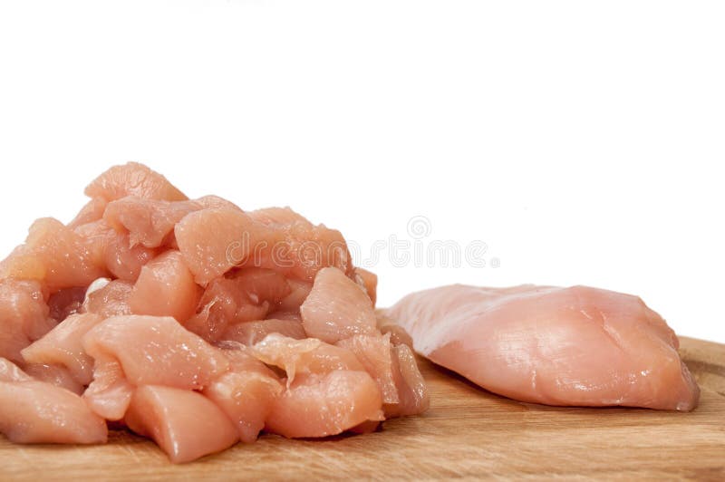 Chopped chicken white meat on the wooden board stock photography Chopped chicken white meat on the wooden board stock photography