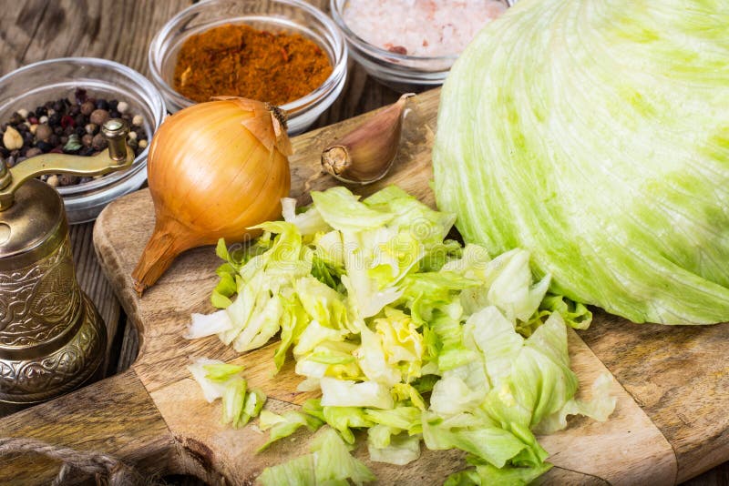 Chopped Iceberg Lettuce. Green Healthy Organic Food. on the Table with
