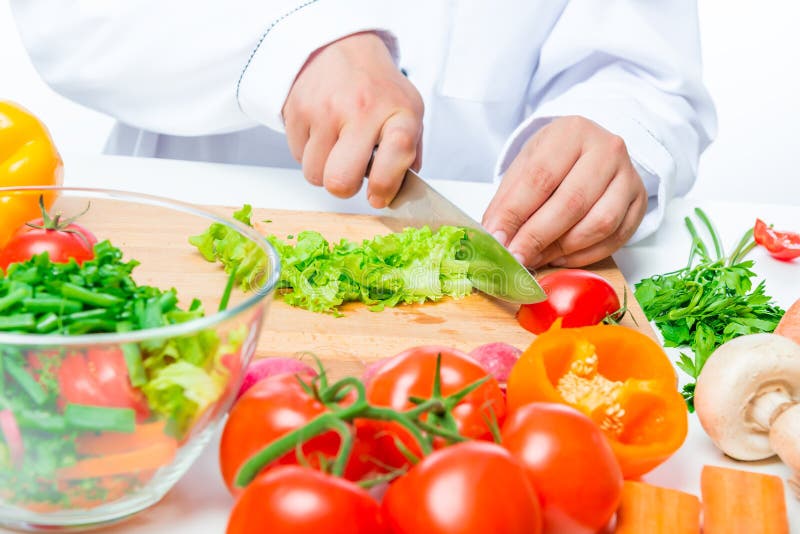 Chopped Lettuce and Cook Hand with a Knife Stock Image Image of