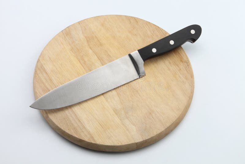 Chopping board with knife stock photo. Image of hardwood 10553874