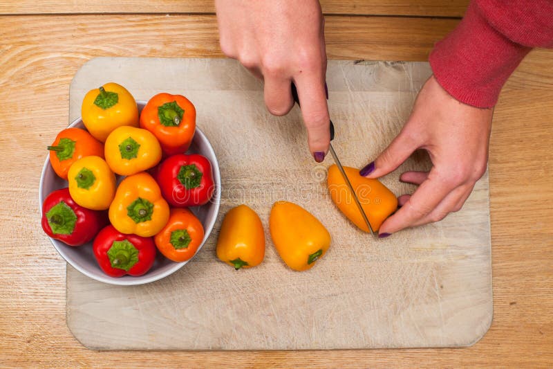Chopping mini peppers stock image. Image of cuisine, nutrition 33365193