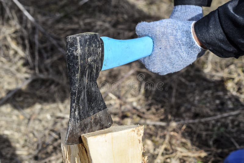 Chopping wood with an ax stock image. Image of chop 141996687