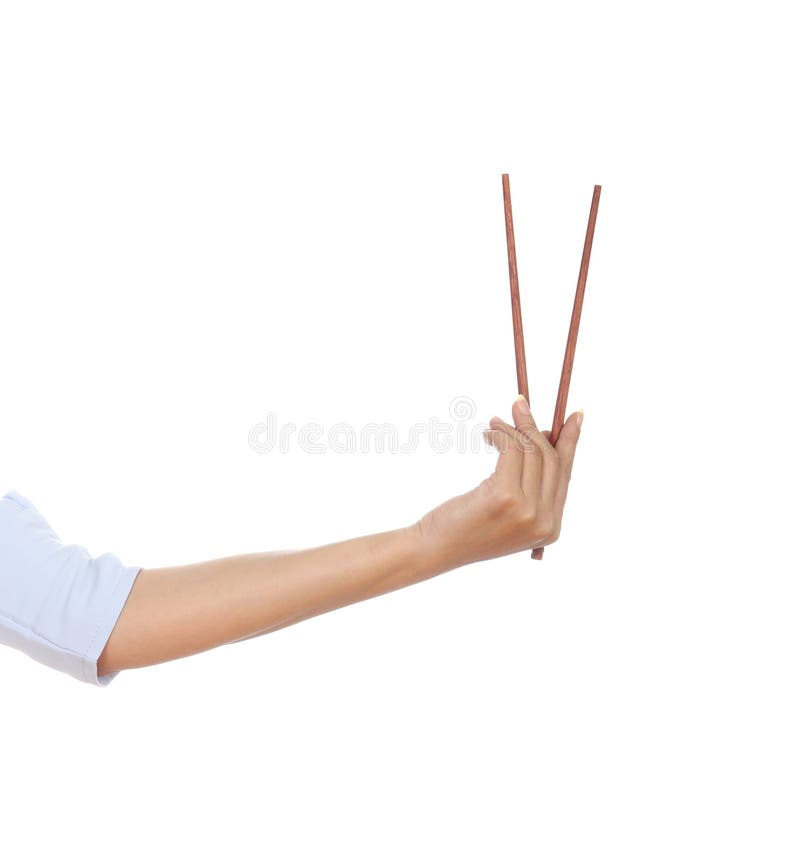 Chopsticks in a hand stock photography Chopsticks in a hand stock photography