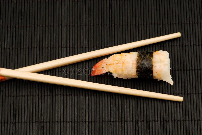 chopsticks σούσια nigiri στοκ εικόνες με δικαίωμα ελεύθερης χρήσης chopsticks σούσια nigiri στοκ εικόνες με δικαίωμα ελεύθερης χρήσης