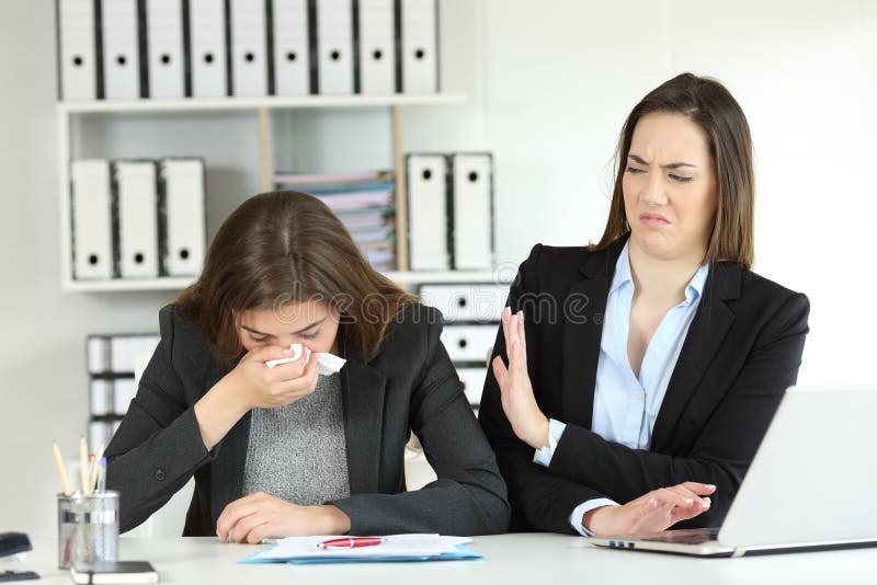 Ill businesswoman blowing and a colleague rejecting her at office. Ill businesswoman blowing and a colleague rejecting her at office