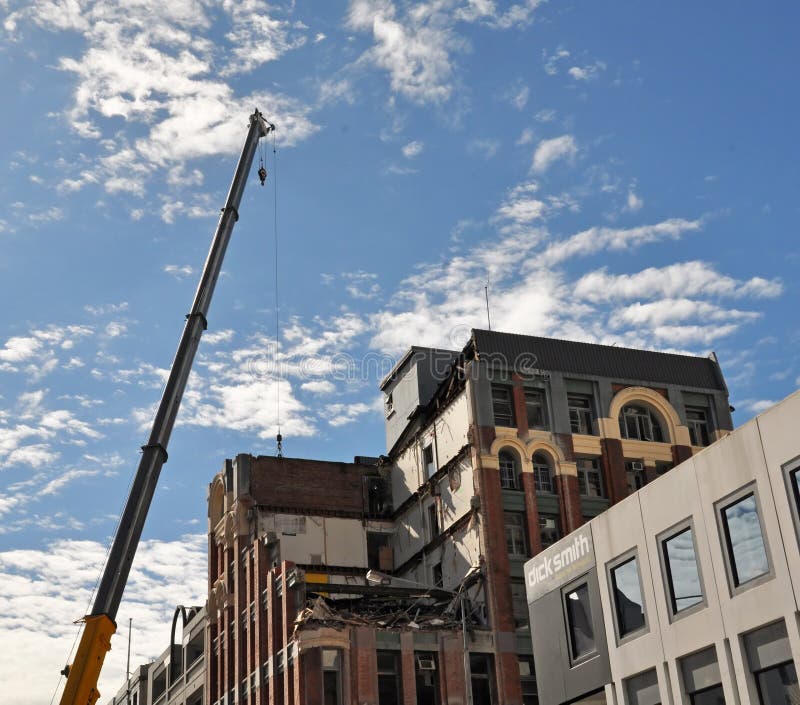 11 November 2010 - Christchurch, New Zealand. Demolition of the historic 7 story MLC building at 161 Manchester street is underway. The 15 October 5.1 earthquake aftershock rendered the building dangerous. 11 November 2010 - Christchurch, New Zealand. Demolition of the historic 7 story MLC building at 161 Manchester street is underway. The 15 October 5.1 earthquake aftershock rendered the building dangerous.