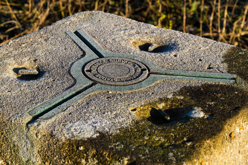 Editorial, Top bracket of Ordinance Survey Trig Point with frost stock photography Editorial, Top bracket of Ordinance Survey Trig Point with frost stock photography