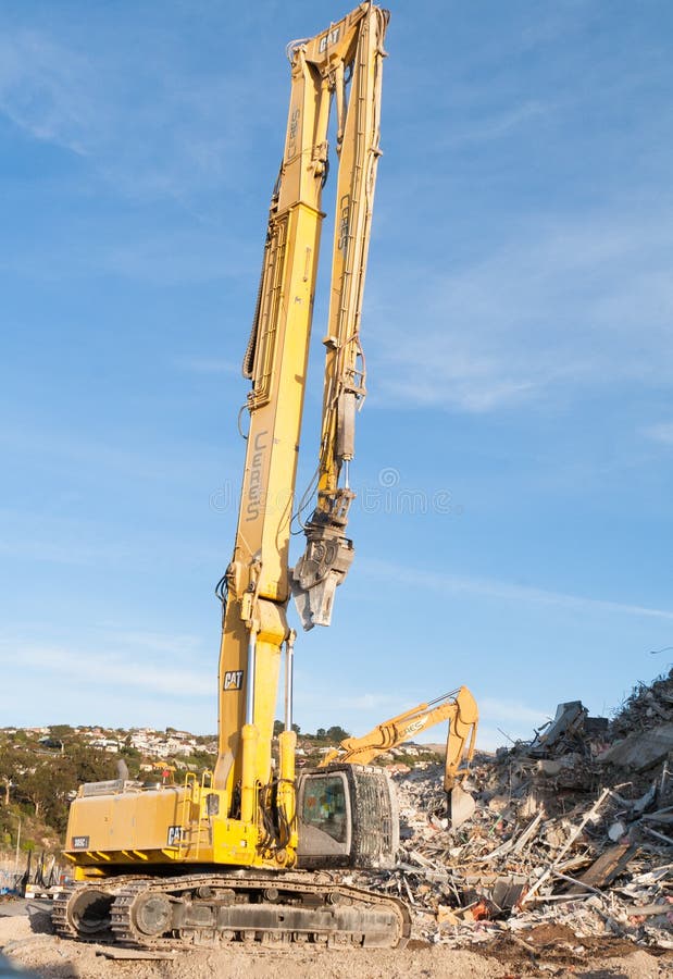 Christchurch, New Zealand - May 20, 2012: Excavator working afte