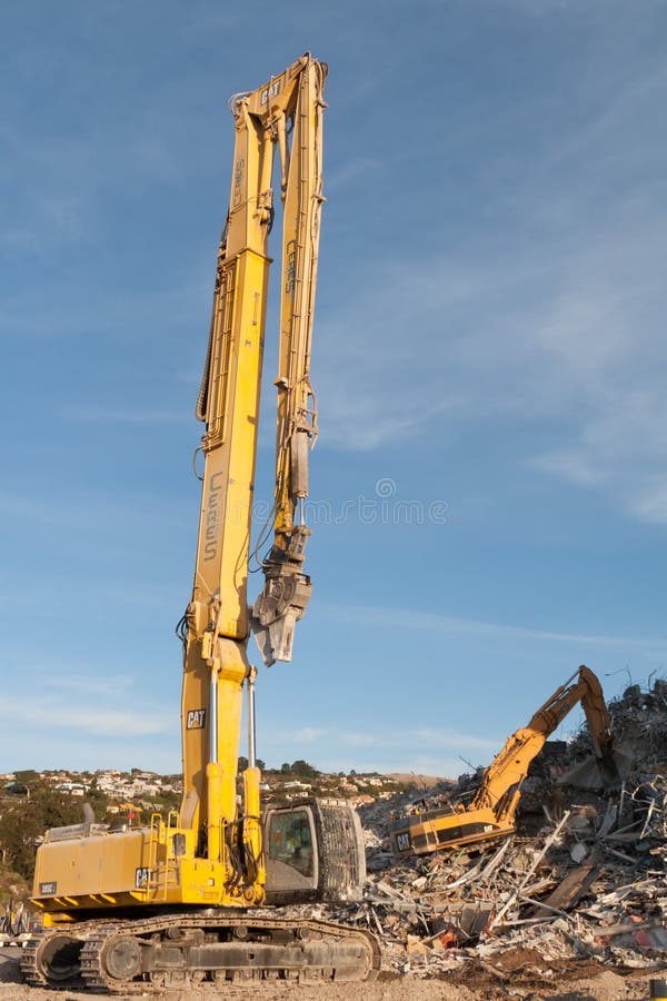 Christchurch, New Zealand - May 20, 2012: Excavator working afte