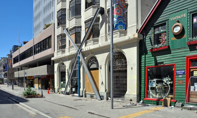 29 October 2011, Christchurch, New Zealand. While neighbouring Cashel Street Mall is now open Hereford Street shops and buidlings are still closed after the devastating earthquake in February 2011. In the foreground is the iconic Shands Emporium alongside Gough House braced to avoid further damage from the ongoing earthquakes. 29 October 2011, Christchurch, New Zealand. While neighbouring Cashel Street Mall is now open Hereford Street shops and buidlings are still closed after the devastating earthquake in February 2011. In the foreground is the iconic Shands Emporium alongside Gough House braced to avoid further damage from the ongoing earthquakes.