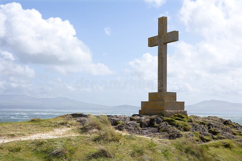 Christian Cross Monument overlooking the Irish sea, Llanddwyn Island, Anglesey, Wales.