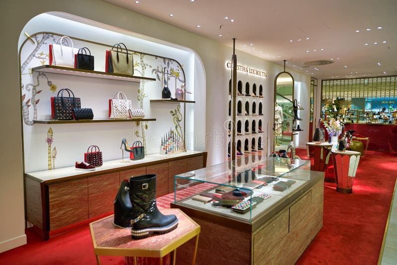 Christian Louboutin Bags and Shoes on Display Editorial Photo - Image ...