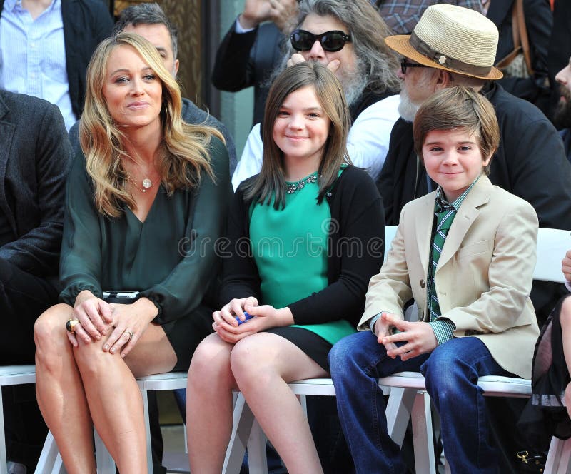 LOS ANGELES, CA - DECEMBER 3, 2013: Ben Stiller\'s wife Christine Taylor & children Ella, 11, & Quinlin, 8, at the TCL Chinese Theatre where Stiller had his hand & footprints set in cement. LOS ANGELES, CA - DECEMBER 3, 2013: Ben Stiller\'s wife Christine Taylor & children Ella, 11, & Quinlin, 8, at the TCL Chinese Theatre where Stiller had his hand & footprints set in cement