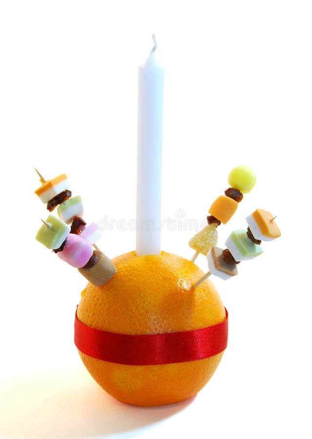 A Christingle orange used as a symbol in Christmas services held for children. A Christingle orange used as a symbol in Christmas services held for children.