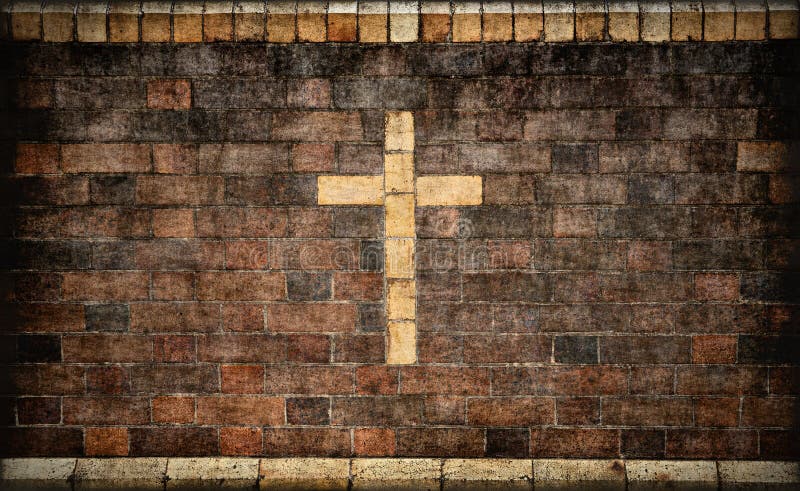 Christliches Kreuz in der Backsteinmauer