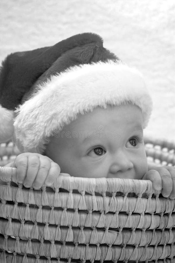 Christmas Baby stock image. Image of curious, holding 1745093