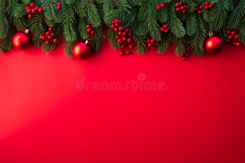 Christmas background concept. Top view of Christmas with spruce branches, pine cones, red berries