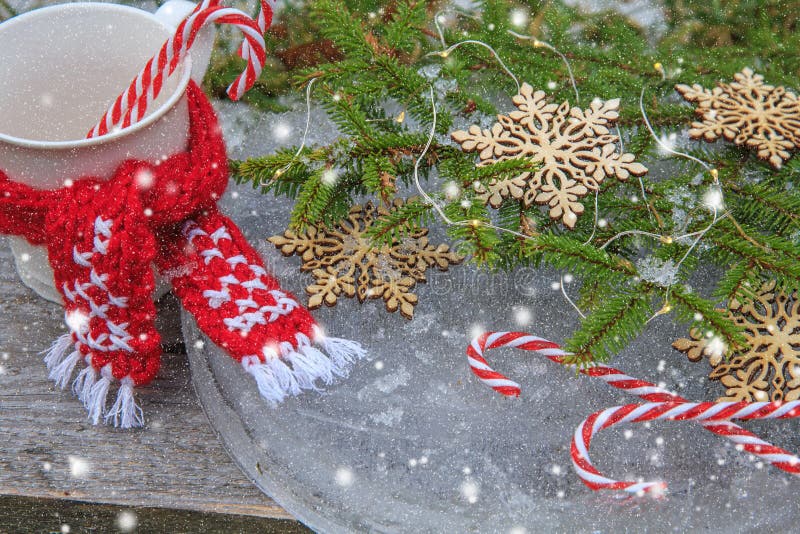 Christmas background with fir branches,decorated snowflakes and candy canes on the ice in vintage style royalty free stock photography Christmas background with fir branches,decorated snowflakes and candy canes on the ice in vintage style royalty free stock photography