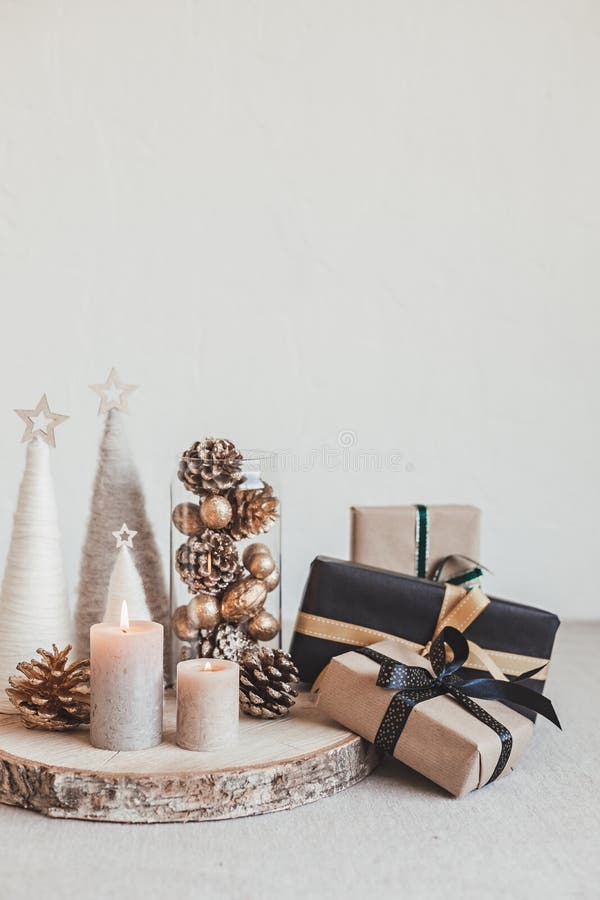 Christmas Background With Gift Boxes And Rolls Of Kraft Wrapping