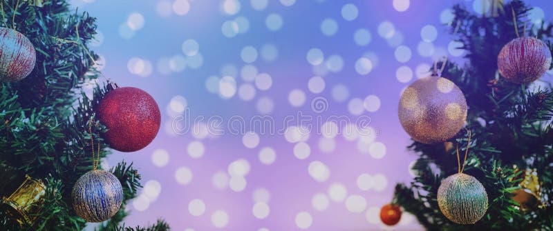 Christmas background. Panoramic Christmas tree with colorful Bokeh lights backgrounds